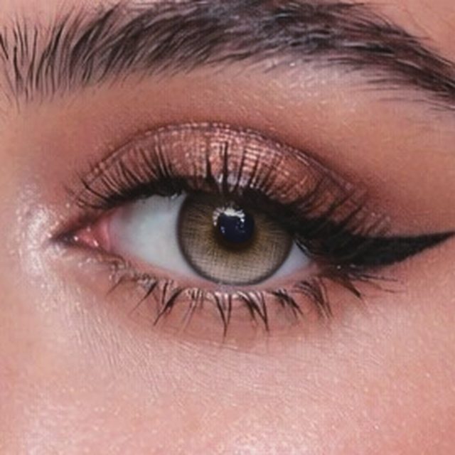 Close-up of an eye wearing Bella Brown lenses