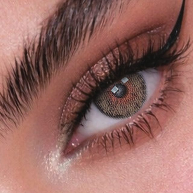 Close-up of an eye wearing Fancy Brown lenses
