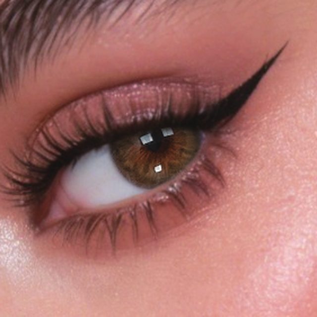 Close-up of an eye wearing Fancy Hazel lenses