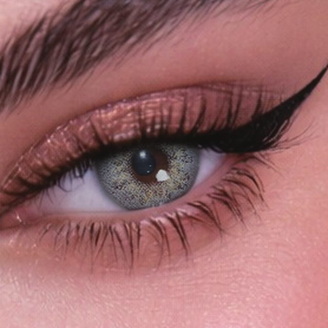 Close-up of an eye wearing Gorgeous Green lenses